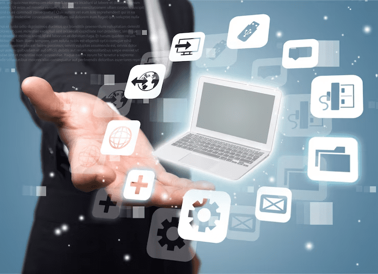 Businessperson presenting a digital interface with floating laptop and finance-related icons, symbolizing modern digital banking solutions and online financial management.